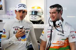 (L to R): Adrian Sutil (GER) Sahara Force India F1 with Bradley Joyce (GBR) Sahara Force India F1 Race Engineer. 25.10.2013. Formula 1 World Championship, Rd 16, Indian Grand Prix, New Delhi, India, Practice Day.