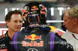 Sebastian Vettel (GER) Red Bull Racing with Christian Horner (GBR) Red Bull Racing Team Principal (Left) and Dr Helmut Marko (AUT) Red Bull Motorsport Consultant (Right). 25.10.2013. Formula 1 World Championship, Rd 16, Indian Grand Prix, New Delhi, India, Practice Day.