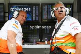 (L to R): Robert Fernley (GBR) Sahara Force India F1 Team Deputy Team Principal and Dr. Vijay Mallya (IND) Sahara Force India F1 Team Owner on the pit gantry. 25.10.2013. Formula 1 World Championship, Rd 16, Indian Grand Prix, New Delhi, India, Practice Day.
