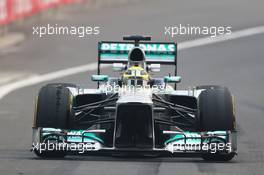 Nico Rosberg (GER) Mercedes AMG F1 W04 with worn Pirelli tyres. 25.10.2013. Formula 1 World Championship, Rd 16, Indian Grand Prix, New Delhi, India, Practice Day.