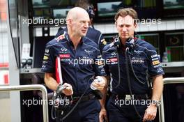(L to R): Adrian Newey (GBR) Red Bull Racing Chief Technical Officer with Christian Horner (GBR) Red Bull Racing Team Principal. 25.10.2013. Formula 1 World Championship, Rd 16, Indian Grand Prix, New Delhi, India, Practice Day.