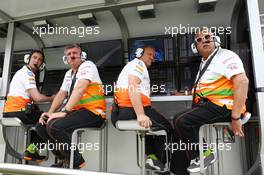 (L to R): Otmar Szafnauer (USA) Sahara Force India F1 Chief Operating Officer with Robert Fernley (GBR) Sahara Force India F1 Team Deputy Team Principal and Dr. Vijay Mallya (IND) Sahara Force India F1 Team Owner on the pit gantry. 25.10.2013. Formula 1 World Championship, Rd 16, Indian Grand Prix, New Delhi, India, Practice Day.