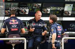 Adrian Newey (GBR) Red Bull Racing Chief Technical Officer (Centre) and Christian Horner (GBR) Red Bull Racing Team Principal (Right) on the pit gantry. 25.10.2013. Formula 1 World Championship, Rd 16, Indian Grand Prix, New Delhi, India, Practice Day.