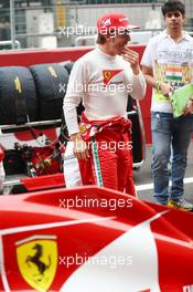 Fernando Alonso (ESP) Ferrari on the grid. 27.10.2013. Formula 1 World Championship, Rd 16, Indian Grand Prix, New Delhi, India, Race Day.
