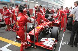 Fernando Alonso (ESP) Ferrari F138 on the grid. 27.10.2013. Formula 1 World Championship, Rd 16, Indian Grand Prix, New Delhi, India, Race Day.