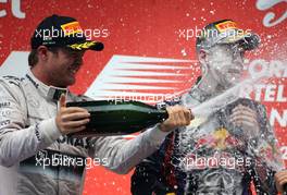 Nico Rosberg (GER), Mercedes GP and Sebastian Vettel (GER), Red Bull Racing  27.10.2013. Formula 1 World Championship, Rd 16, Indian Grand Prix, New Delhi, India, Race Day.
