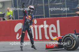 Race winner and World Champion Sebastian Vettel (GER) Red Bull Racing RB9 celebrates at the end of the race. 27.10.2013. Formula 1 World Championship, Rd 16, Indian Grand Prix, New Delhi, India, Race Day.