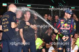 Sebastian Vettel (GER) Red Bull Racing celebrates his 4th championship win with the team. 27.10.2013. Formula 1 World Championship, Rd 16, Indian Grand Prix, New Delhi, India, Race Day.