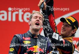 Sebastian Vettel (GER), Red Bull Racing and Romain Grosjean (FRA), Lotus F1 Team  27.10.2013. Formula 1 World Championship, Rd 16, Indian Grand Prix, New Delhi, India, Race Day.