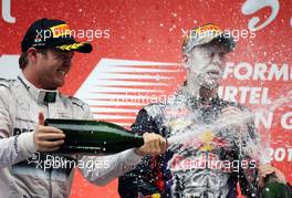 Nico Rosberg (GER), Mercedes GP ans Sebastian Vettel (GER), Red Bull Racing  27.10.2013. Formula 1 World Championship, Rd 16, Indian Grand Prix, New Delhi, India, Race Day.