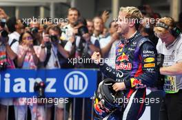 Race winner and World Champion Sebastian Vettel (GER) Red Bull Racing celebrates in parc ferme. 27.10.2013. Formula 1 World Championship, Rd 16, Indian Grand Prix, New Delhi, India, Race Day.