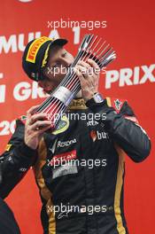 Romain Grosjean (FRA) Lotus F1 Team celebrates his third position on the podium. 27.10.2013. Formula 1 World Championship, Rd 16, Indian Grand Prix, New Delhi, India, Race Day.