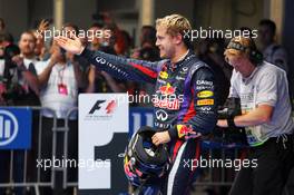 Race winner and World Champion Sebastian Vettel (GER) Red Bull Racing celebrates in parc ferme. 27.10.2013. Formula 1 World Championship, Rd 16, Indian Grand Prix, New Delhi, India, Race Day.