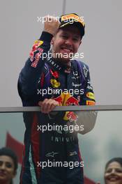 1st place a 2013 World champion Sebastian Vettel (GER) Red Bull Racing. 27.10.2013. Formula 1 World Championship, Rd 16, Indian Grand Prix, New Delhi, India, Race Day.
