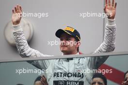 Nico Rosberg (GER) Mercedes AMG F1 celebrates his second position on the podium. 27.10.2013. Formula 1 World Championship, Rd 16, Indian Grand Prix, New Delhi, India, Race Day.