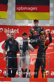 1st place a 2013 World champion Sebastian Vettel (GER) Red Bull Racing, 2nd place Nico Rosberg (GER) Mercedes AMG F1 W04 and 3rd place Romain Grosjean (FRA) Lotus F1 Team. 27.10.2013. Formula 1 World Championship, Rd 16, Indian Grand Prix, New Delhi, India, Race Day.