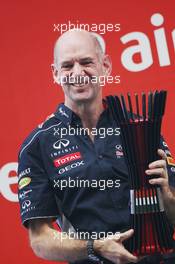 Adrian Newey (GBR) Red Bull Racing Chief Technical Officer celebrates on the podium. 27.10.2013. Formula 1 World Championship, Rd 16, Indian Grand Prix, New Delhi, India, Race Day.