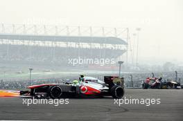 Sergio Perez (MEX) McLaren MP4-28. 27.10.2013. Formula 1 World Championship, Rd 16, Indian Grand Prix, New Delhi, India, Race Day.
