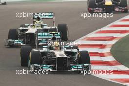Lewis Hamilton (GBR) Mercedes AMG F1 W04 leads team mate Nico Rosberg (GER) Mercedes AMG F1 W04. 27.10.2013. Formula 1 World Championship, Rd 16, Indian Grand Prix, New Delhi, India, Race Day.