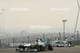 Nico Rosberg (GER) Mercedes AMG F1 W04 leads team mate Lewis Hamilton (GBR) Mercedes AMG F1 W04. 27.10.2013. Formula 1 World Championship, Rd 16, Indian Grand Prix, New Delhi, India, Race Day.