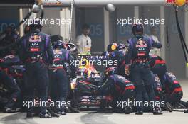 Mark Webber (AUS) Red Bull Racing RB9 makes a pit stop. 27.10.2013. Formula 1 World Championship, Rd 16, Indian Grand Prix, New Delhi, India, Race Day.