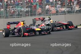 Sebastian Vettel (GER), Red Bull Racing and Sergio Perez (MEX), McLaren Mercedes  27.10.2013. Formula 1 World Championship, Rd 16, Indian Grand Prix, New Delhi, India, Race Day.