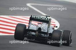 Lewis Hamilton (GBR) Mercedes AMG F1 W04 leaves the pits. 26.10.2013. Formula 1 World Championship, Rd 16, Indian Grand Prix, New Delhi, India, Qualifying Day.