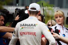Paul di Resta (GBR) Sahara Force India F1 with the media. 26.10.2013. Formula 1 World Championship, Rd 16, Indian Grand Prix, New Delhi, India, Qualifying Day.