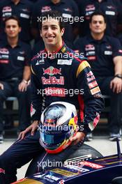 Daniel Ricciardo (AUS) Scuderia Toro Rosso STR8 at a team photograph. 26.10.2013. Formula 1 World Championship, Rd 16, Indian Grand Prix, New Delhi, India, Qualifying Day.