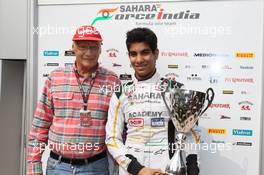 Jehan Daruvala (IND) Sahara Force India Academy Driver, winner of the British KF3 Karting Championship, with Niki Lauda (AUT) Mercedes Non-Executive Chairman. 26.10.2013. Formula 1 World Championship, Rd 16, Indian Grand Prix, New Delhi, India, Qualifying Day.