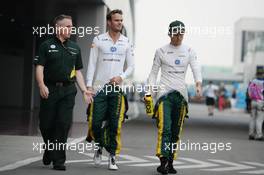 (L to R): Tom Webb (GBR) Caterham F1 Team Head of Communications with Giedo van der Garde (NLD) Caterham F1 Team and Charles Pic (FRA) Caterham. 26.10.2013. Formula 1 World Championship, Rd 16, Indian Grand Prix, New Delhi, India, Qualifying Day.