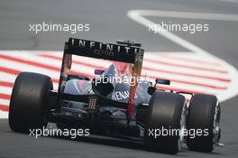 Sebastian Vettel (GER) Red Bull Racing RB9 leaves the pits. 26.10.2013. Formula 1 World Championship, Rd 16, Indian Grand Prix, New Delhi, India, Qualifying Day.