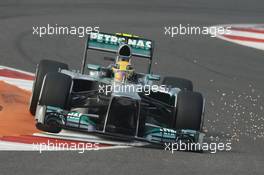 Lewis Hamilton (GBR) Mercedes AMG F1 W04 sends sparks flying. 26.10.2013. Formula 1 World Championship, Rd 16, Indian Grand Prix, New Delhi, India, Qualifying Day.