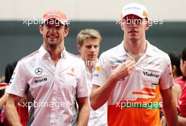 Jenson Button (GBR), McLaren Mercedes and Paul di Resta (GBR), Force India Formula One Team  27.10.2013. Formula 1 World Championship, Rd 16, Indian Grand Prix, New Delhi, India, Race Day.