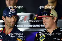 (L to R): Mark Webber (AUS) Red Bull Racing and Kimi Raikkonen (FIN) Lotus F1 Team in the FIA Press Conference. 24.10.2013. Formula 1 World Championship, Rd 16, Indian Grand Prix, New Delhi, India, Preparation Day.