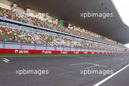 Circuit main start / finish grandstand. 24.10.2013. Formula 1 World Championship, Rd 16, Indian Grand Prix, New Delhi, India, Preparation Day.