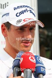 Adrian Sutil (GER) Sahara Force India F1 with the media. 24.10.2013. Formula 1 World Championship, Rd 16, Indian Grand Prix, New Delhi, India, Preparation Day.