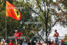 Fans and a Ferrari flag. 06.09.2013. Formula 1 World Championship, Rd 12, Italian Grand Prix, Monza, Italy, Practice Day.