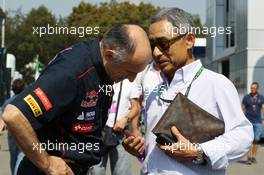 (L to R): Franz Tost (AUT) Scuderia Toro Rosso Team Principal with Hiroshi Yasukawa (JPN) Dorna Sports Adviser. 06.09.2013. Formula 1 World Championship, Rd 12, Italian Grand Prix, Monza, Italy, Practice Day.