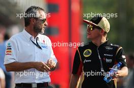 (L to R): Beat Zehnder (SUI) Sauber F1 Team Manager with Kimi Raikkonen (FIN) Lotus F1 Team. 06.09.2013. Formula 1 World Championship, Rd 12, Italian Grand Prix, Monza, Italy, Practice Day.