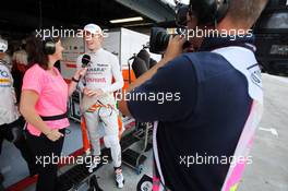 Paul di Resta (GBR) Sahara Force India F1 with Lee McKenzie (GBR) BBC Television Reporter. 06.09.2013. Formula 1 World Championship, Rd 12, Italian Grand Prix, Monza, Italy, Practice Day.