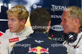 (L to R): Sebastian Vettel (GER) Red Bull Racing with Christian Horner (GBR) Red Bull Racing Team Principal and Dr Helmut Marko (AUT) Red Bull Motorsport Consultant. 06.09.2013. Formula 1 World Championship, Rd 12, Italian Grand Prix, Monza, Italy, Practice Day.