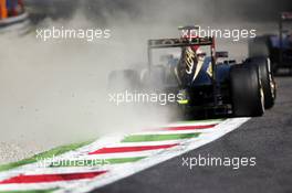 Romain Grosjean (FRA) Lotus F1 E21 runs wide. 06.09.2013. Formula 1 World Championship, Rd 12, Italian Grand Prix, Monza, Italy, Practice Day.