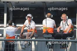 (L to R): Adrian Sutil (GER) Sahara Force India F1; Robert Fernley (GBR) Sahara Force India F1 Team Deputy Team Principal; and Andrew Green (GBR) Sahara Force India F1 Team Technical Director on the pit gantry. 06.09.2013. Formula 1 World Championship, Rd 12, Italian Grand Prix, Monza, Italy, Practice Day.