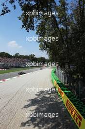 Lewis Hamilton (GBR) Mercedes AMG F1 W04 leads Romain Grosjean (FRA) Lotus F1 E21. 06.09.2013. Formula 1 World Championship, Rd 12, Italian Grand Prix, Monza, Italy, Practice Day.