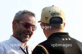 (L to R): Beat Zehnder (SUI) Sauber F1 Team Manager with Kimi Raikkonen (FIN) Lotus F1 Team. 06.09.2013. Formula 1 World Championship, Rd 12, Italian Grand Prix, Monza, Italy, Practice Day.