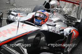 Jenson Button (GBR) McLaren MP4-28 on the grid. 08.09.2013. Formula 1 World Championship, Rd 12, Italian Grand Prix, Monza, Italy, Race Day.
