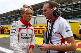 Max Chilton (GBR) Marussia F1 Team with Gary Gannon (GBR) Marussia F1 Team Race Engineer on the grid. 08.09.2013. Formula 1 World Championship, Rd 12, Italian Grand Prix, Monza, Italy, Race Day.