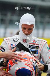 Jenson Button (GBR) McLaren on the grid. 08.09.2013. Formula 1 World Championship, Rd 12, Italian Grand Prix, Monza, Italy, Race Day.