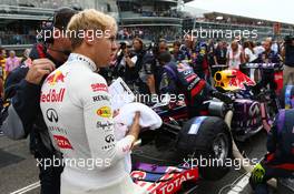 Sebastian Vettel (GER) Red Bull Racing on the grid. 08.09.2013. Formula 1 World Championship, Rd 12, Italian Grand Prix, Monza, Italy, Race Day.